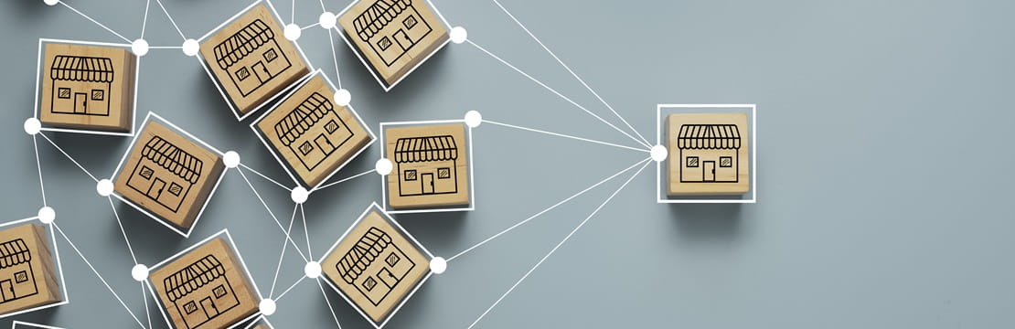 Multiple boxes on a table connected to on single box by a line